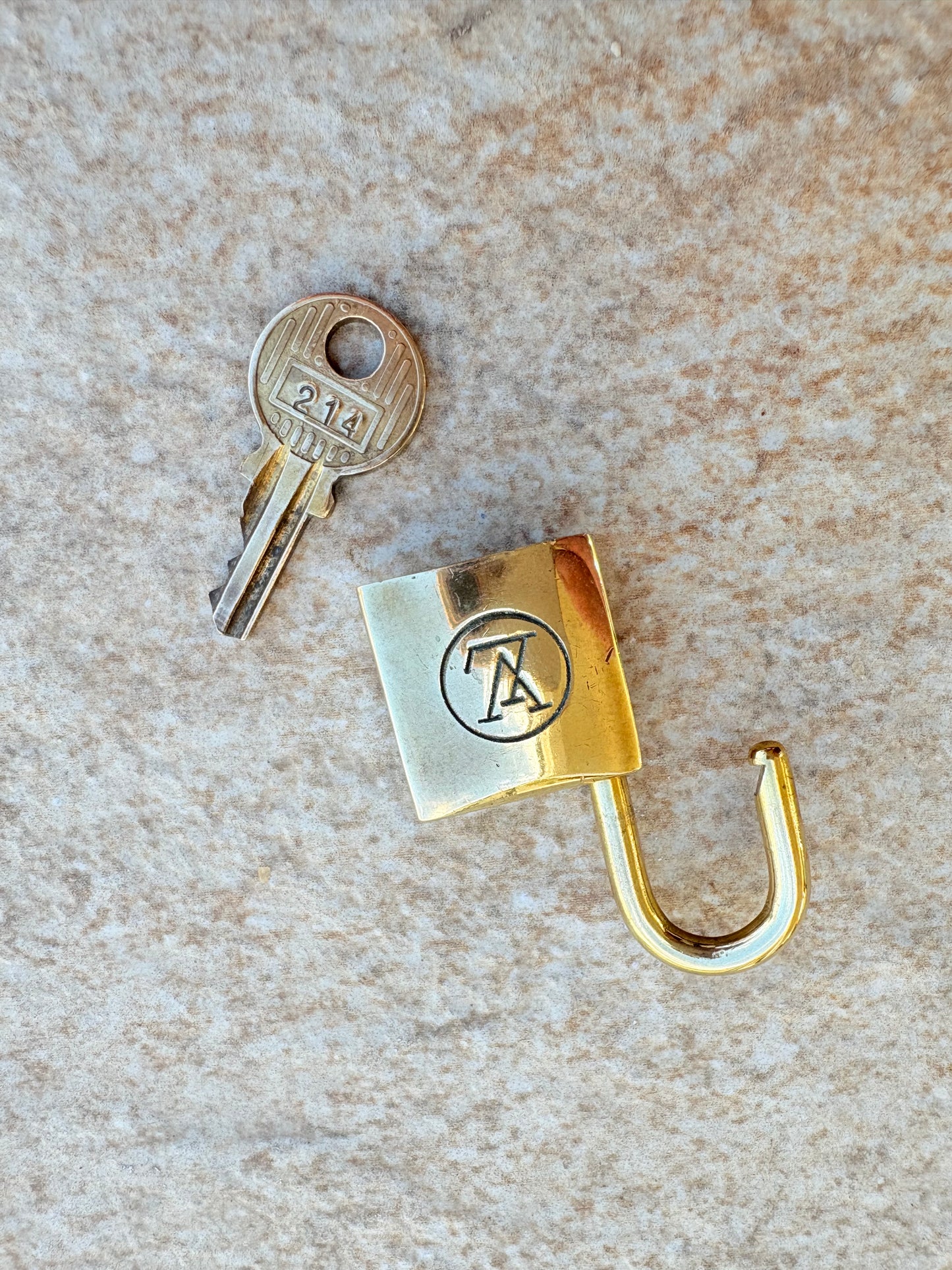 Authentic Louis Vuitton Brass Padlock & Key Set (#214)